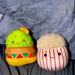 2 squishmallows, popcorn and a taco
